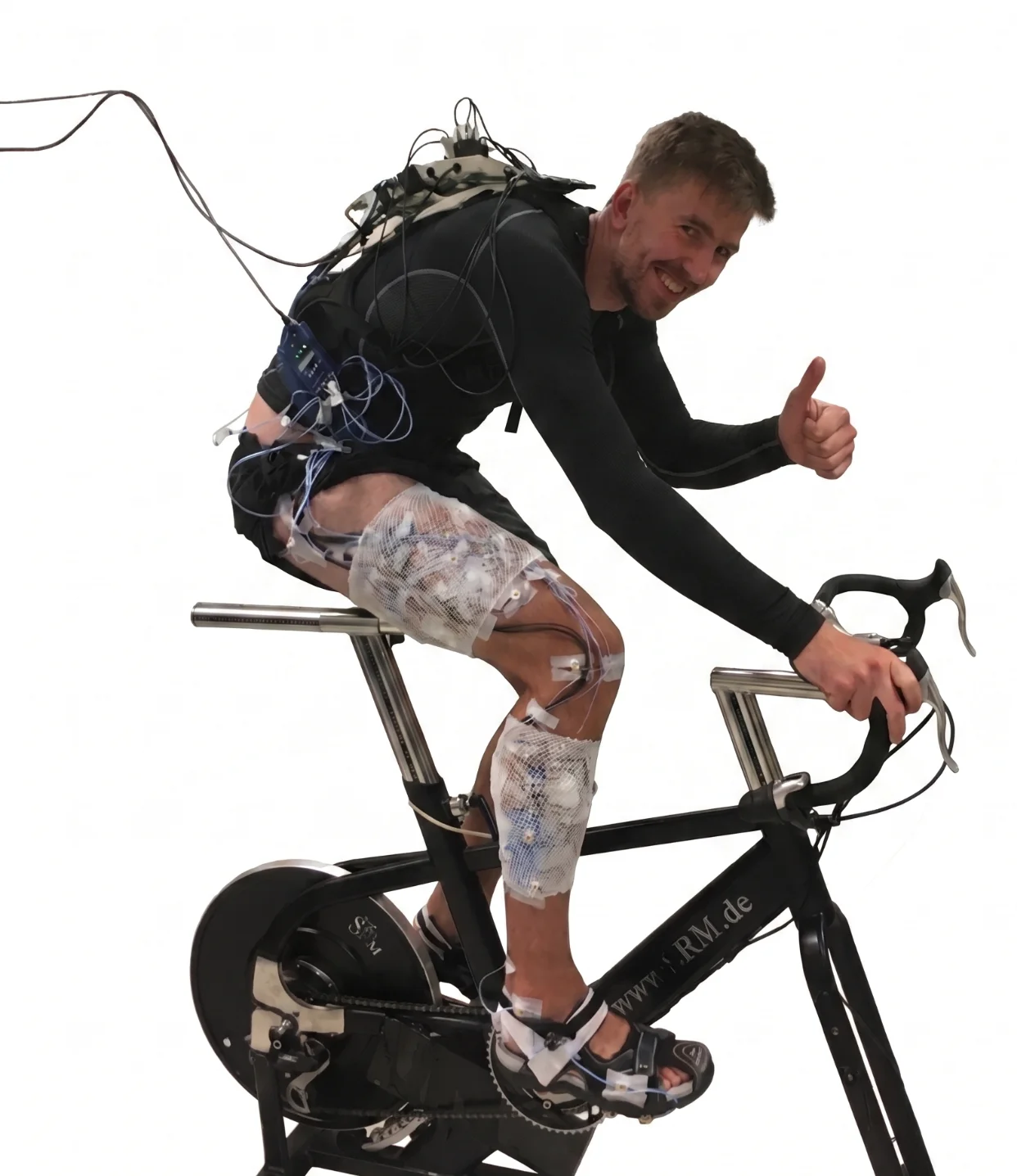 Pawel Kudzia instrumented with EMG sensors on a cycling ergometer